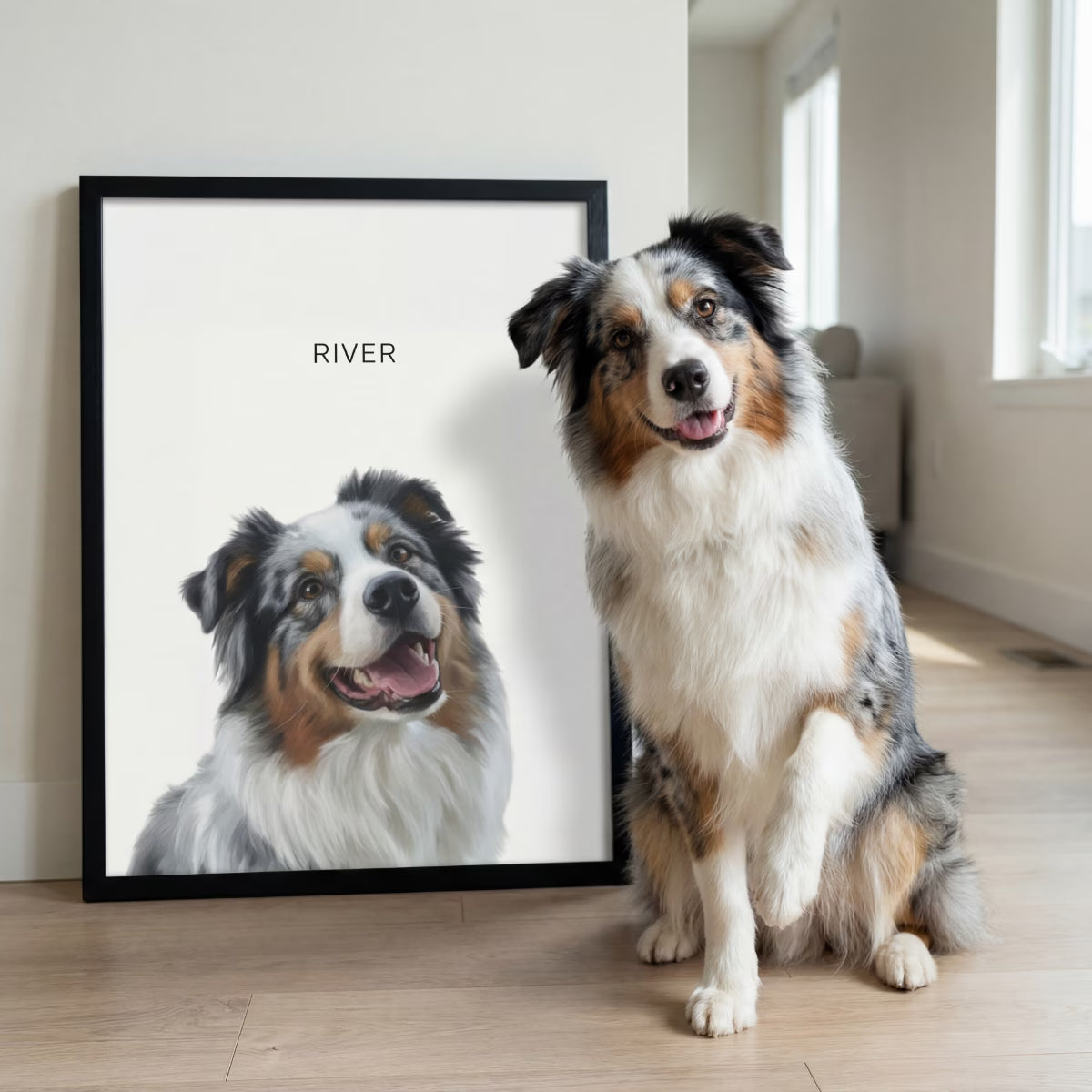 Dog sitting next to a framed portrait of itself with 'River' written above.